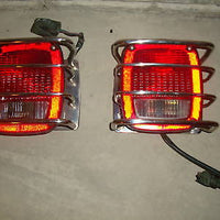 87-06 JEEP WRANGLER TAILLIGHTS W/ GUARD FREE CHROME GAS